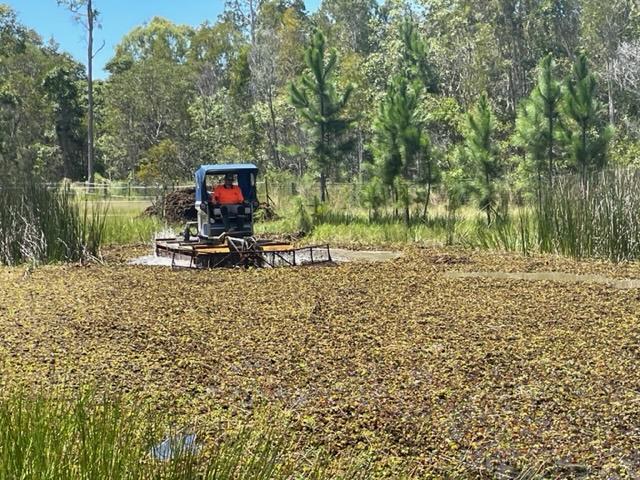 Truxor working in an infested pond