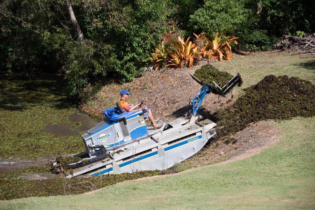 Truxor cleaning weeds in a waterway